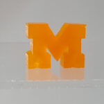 Examples of 3D printed models showcasing University of Michigan's rapid volumetric printing technology.