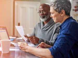 Older couple reviewing social security benefits